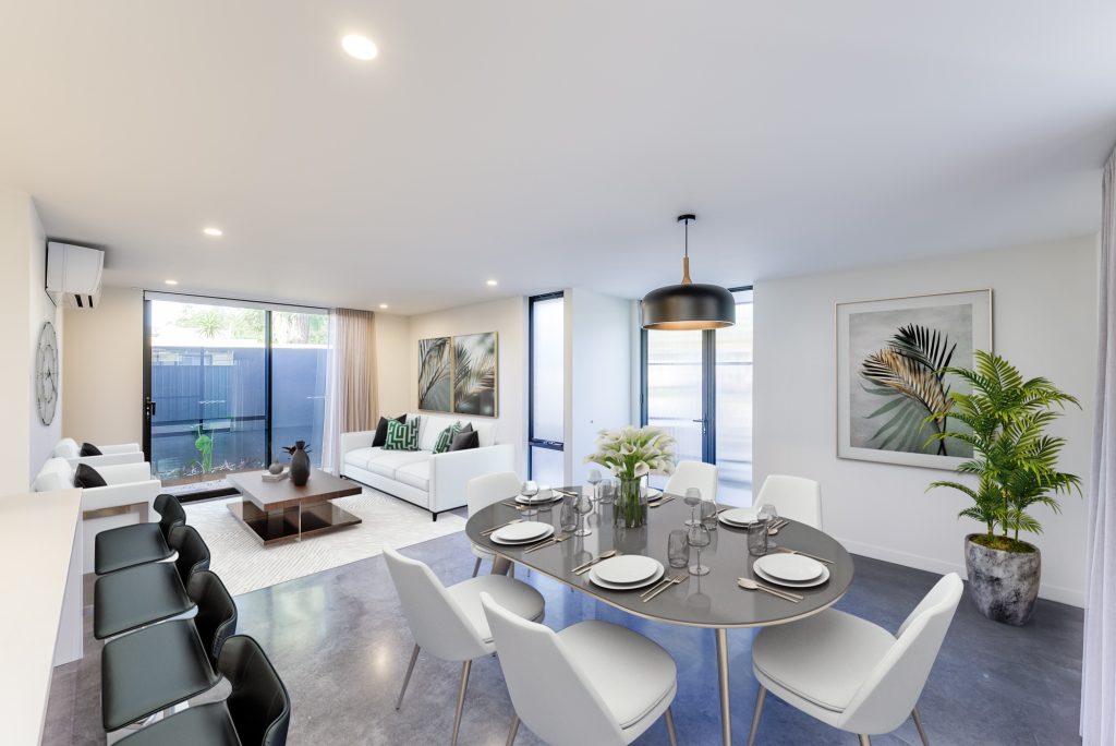 Bright open-plan living and dining area with modern furnishings, neutral interior palette and contemporary design